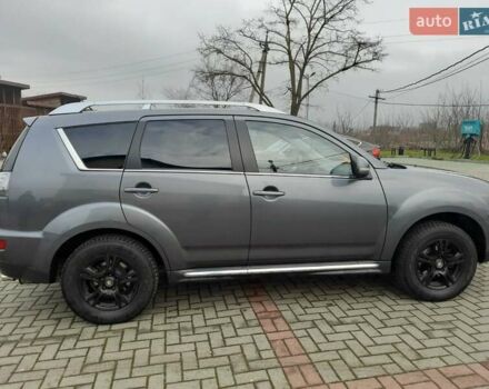 Синий Мицубиси Аутлендер, объемом двигателя 2 л и пробегом 200 тыс. км за 10500 $, фото 14 на Automoto.ua