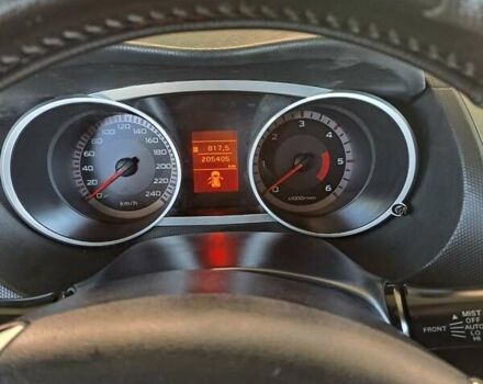 Синий Мицубиси Аутлендер, объемом двигателя 2.18 л и пробегом 205 тыс. км за 11000 $, фото 6 на Automoto.ua