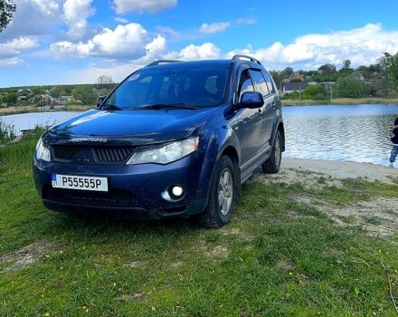 Синий Мицубиси Аутлендер, объемом двигателя 2.4 л и пробегом 284 тыс. км за 9250 $, фото 6 на Automoto.ua