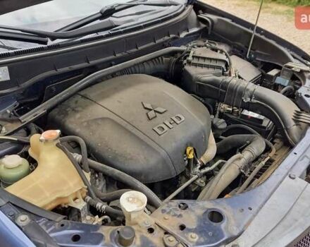 Синий Мицубиси Аутлендер, объемом двигателя 2.18 л и пробегом 205 тыс. км за 11000 $, фото 11 на Automoto.ua