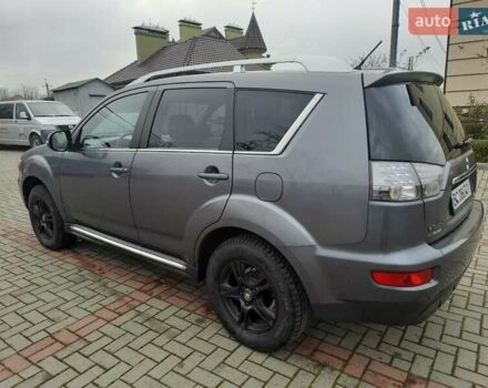 Синий Мицубиси Аутлендер, объемом двигателя 2 л и пробегом 200 тыс. км за 10500 $, фото 8 на Automoto.ua