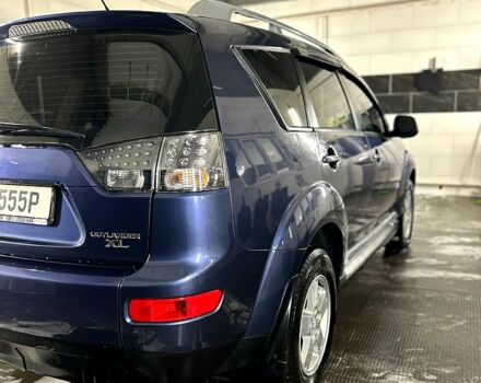 Синий Мицубиси Аутлендер, объемом двигателя 2.4 л и пробегом 284 тыс. км за 9250 $, фото 7 на Automoto.ua