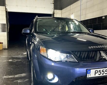 Синий Мицубиси Аутлендер, объемом двигателя 2.4 л и пробегом 284 тыс. км за 9250 $, фото 8 на Automoto.ua