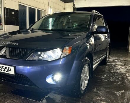 Синий Мицубиси Аутлендер, объемом двигателя 2.4 л и пробегом 284 тыс. км за 9250 $, фото 9 на Automoto.ua