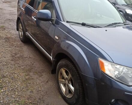 Синий Мицубиси Аутлендер, объемом двигателя 2 л и пробегом 306 тыс. км за 5200 $, фото 3 на Automoto.ua