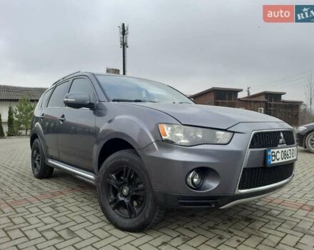 Синий Мицубиси Аутлендер, объемом двигателя 2 л и пробегом 200 тыс. км за 10500 $, фото 17 на Automoto.ua