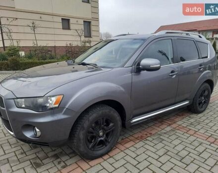 Синий Мицубиси Аутлендер, объемом двигателя 2 л и пробегом 200 тыс. км за 10500 $, фото 5 на Automoto.ua