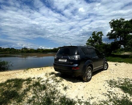 Синий Мицубиси Аутлендер, объемом двигателя 2.4 л и пробегом 284 тыс. км за 9250 $, фото 5 на Automoto.ua