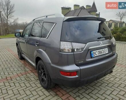Синий Мицубиси Аутлендер, объемом двигателя 2 л и пробегом 200 тыс. км за 10500 $, фото 9 на Automoto.ua
