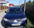 Синий Мицубиси Аутлендер, объемом двигателя 2.18 л и пробегом 205 тыс. км за 11000 $, фото 1 на Automoto.ua