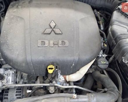 Синий Мицубиси Аутлендер, объемом двигателя 2.18 л и пробегом 205 тыс. км за 11000 $, фото 3 на Automoto.ua