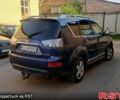 Синий Мицубиси Аутлендер, объемом двигателя 20 л и пробегом 330 тыс. км за 4400 $, фото 3 на Automoto.ua