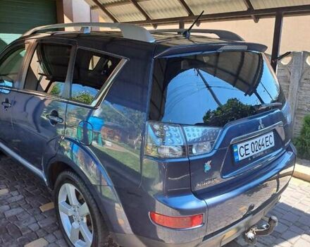 Синий Мицубиси Аутлендер, объемом двигателя 2.18 л и пробегом 205 тыс. км за 11000 $, фото 13 на Automoto.ua