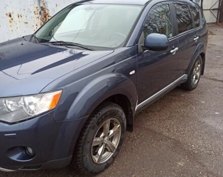 Синий Мицубиси Аутлендер, объемом двигателя 2 л и пробегом 306 тыс. км за 5200 $, фото 1 на Automoto.ua