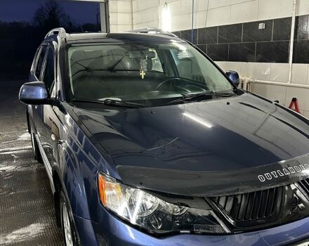 Синий Мицубиси Аутлендер, объемом двигателя 2.4 л и пробегом 284 тыс. км за 9250 $, фото 10 на Automoto.ua