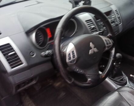 Синий Мицубиси Аутлендер, объемом двигателя 2 л и пробегом 306 тыс. км за 5200 $, фото 2 на Automoto.ua