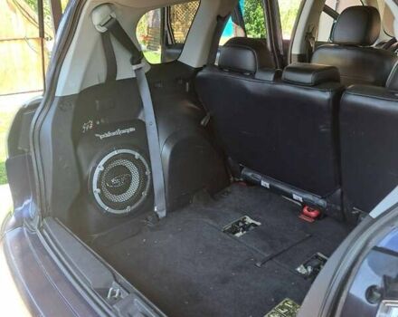 Синий Мицубиси Аутлендер, объемом двигателя 2.18 л и пробегом 205 тыс. км за 11000 $, фото 9 на Automoto.ua