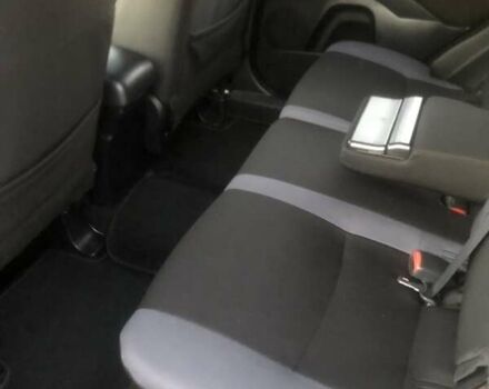 Синий Мицубиси Аутлендер, объемом двигателя 2 л и пробегом 235 тыс. км за 8800 $, фото 4 на Automoto.ua