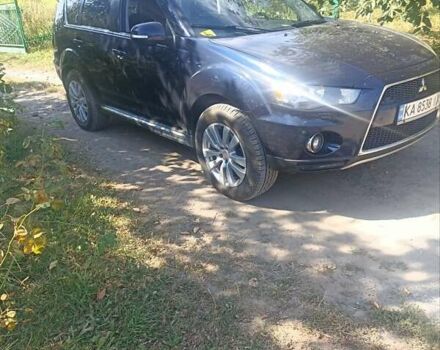 Синий Мицубиси Аутлендер, объемом двигателя 2.18 л и пробегом 223 тыс. км за 11200 $, фото 16 на Automoto.ua