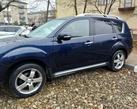 Синий Мицубиси Аутлендер, объемом двигателя 2.2 л и пробегом 220 тыс. км за 11450 $, фото 2 на Automoto.ua