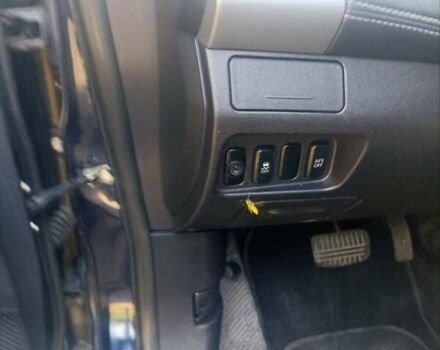 Синий Мицубиси Аутлендер, объемом двигателя 2.18 л и пробегом 223 тыс. км за 11200 $, фото 12 на Automoto.ua