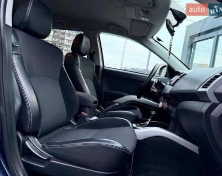 Синий Мицубиси Аутлендер, объемом двигателя 2.18 л и пробегом 289 тыс. км за 9990 $, фото 11 на Automoto.ua