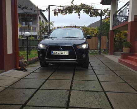 Синий Мицубиси Аутлендер, объемом двигателя 2.2 л и пробегом 295 тыс. км за 10900 $, фото 3 на Automoto.ua