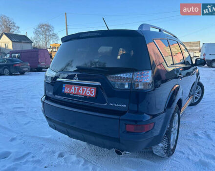 Синий Мицубиси Аутлендер, объемом двигателя 2 л и пробегом 257 тыс. км за 10500 $, фото 4 на Automoto.ua