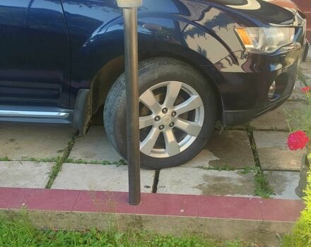 Синий Мицубиси Аутлендер, объемом двигателя 2.2 л и пробегом 295 тыс. км за 10900 $, фото 6 на Automoto.ua