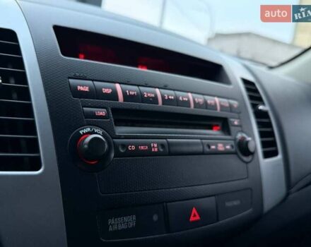 Синий Мицубиси Аутлендер, объемом двигателя 2.18 л и пробегом 289 тыс. км за 9990 $, фото 20 на Automoto.ua