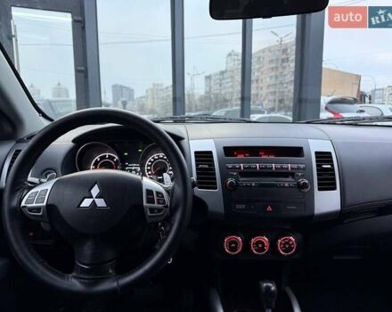 Синий Мицубиси Аутлендер, объемом двигателя 2.18 л и пробегом 289 тыс. км за 9990 $, фото 13 на Automoto.ua