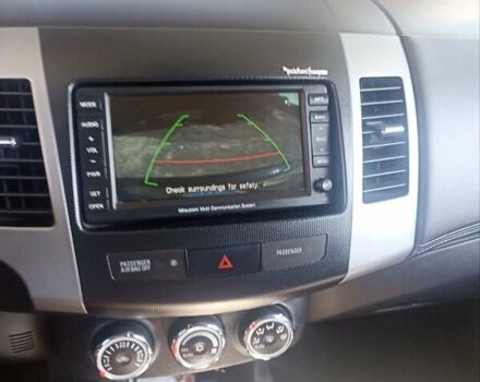 Синий Мицубиси Аутлендер, объемом двигателя 2.18 л и пробегом 223 тыс. км за 11200 $, фото 2 на Automoto.ua