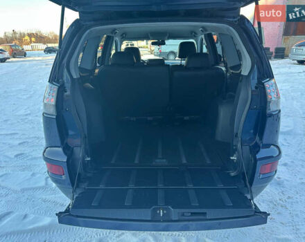 Синий Мицубиси Аутлендер, объемом двигателя 2 л и пробегом 257 тыс. км за 10500 $, фото 19 на Automoto.ua