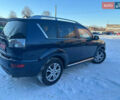 Синий Мицубиси Аутлендер, объемом двигателя 2 л и пробегом 252 тыс. км за 11500 $, фото 5 на Automoto.ua