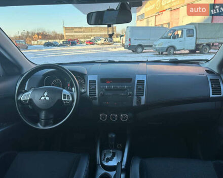 Синий Мицубиси Аутлендер, объемом двигателя 2 л и пробегом 252 тыс. км за 11500 $, фото 18 на Automoto.ua