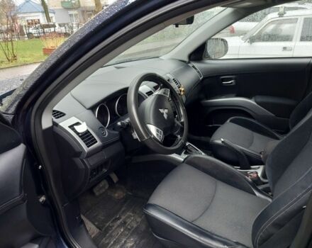 Синий Мицубиси Аутлендер, объемом двигателя 2.2 л и пробегом 220 тыс. км за 11450 $, фото 4 на Automoto.ua