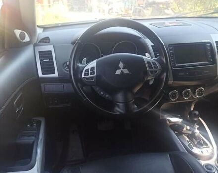 Синий Мицубиси Аутлендер, объемом двигателя 2.18 л и пробегом 223 тыс. км за 11200 $, фото 13 на Automoto.ua