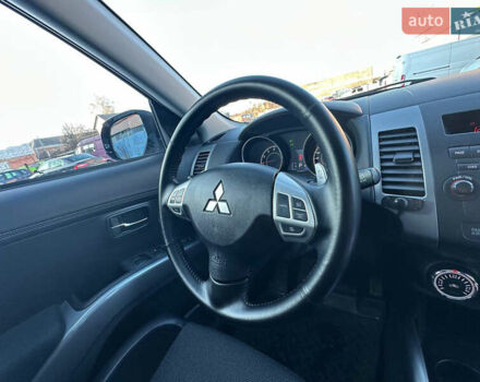 Синий Мицубиси Аутлендер, объемом двигателя 2 л и пробегом 257 тыс. км за 10500 $, фото 14 на Automoto.ua
