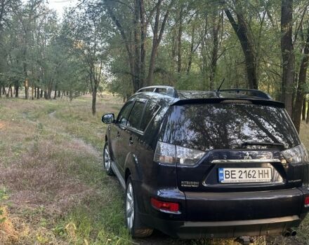 Синий Мицубиси Аутлендер, объемом двигателя 2.3 л и пробегом 248 тыс. км за 11500 $, фото 7 на Automoto.ua
