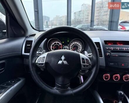 Синий Мицубиси Аутлендер, объемом двигателя 2.18 л и пробегом 289 тыс. км за 9990 $, фото 14 на Automoto.ua