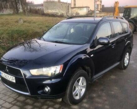 Синий Мицубиси Аутлендер, объемом двигателя 2 л и пробегом 235 тыс. км за 8800 $, фото 7 на Automoto.ua