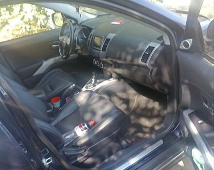 Синий Мицубиси Аутлендер, объемом двигателя 2.18 л и пробегом 223 тыс. км за 11200 $, фото 11 на Automoto.ua