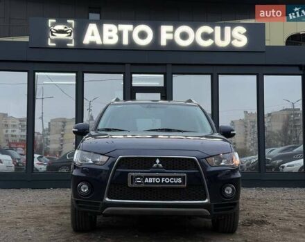 Синий Мицубиси Аутлендер, объемом двигателя 2.18 л и пробегом 289 тыс. км за 9990 $, фото 2 на Automoto.ua