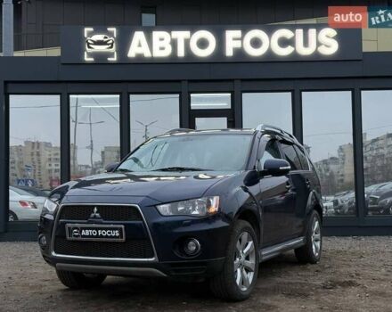 Синий Мицубиси Аутлендер, объемом двигателя 2.18 л и пробегом 289 тыс. км за 9990 $, фото 3 на Automoto.ua
