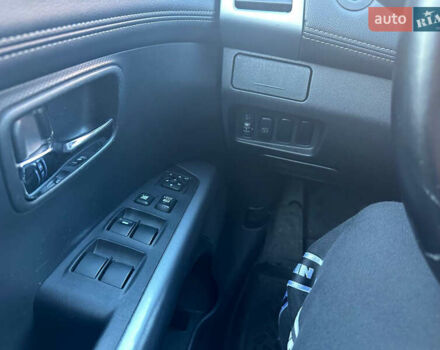 Синий Мицубиси Аутлендер, объемом двигателя 2 л и пробегом 257 тыс. км за 10500 $, фото 24 на Automoto.ua