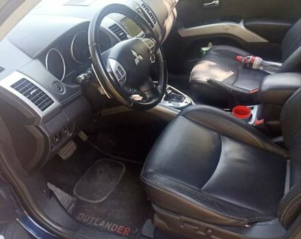 Синий Мицубиси Аутлендер, объемом двигателя 2.18 л и пробегом 223 тыс. км за 11200 $, фото 7 на Automoto.ua