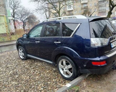 Синий Мицубиси Аутлендер, объемом двигателя 2.2 л и пробегом 220 тыс. км за 11450 $, фото 3 на Automoto.ua