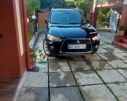 Синий Мицубиси Аутлендер, объемом двигателя 2.2 л и пробегом 295 тыс. км за 10900 $, фото 4 на Automoto.ua