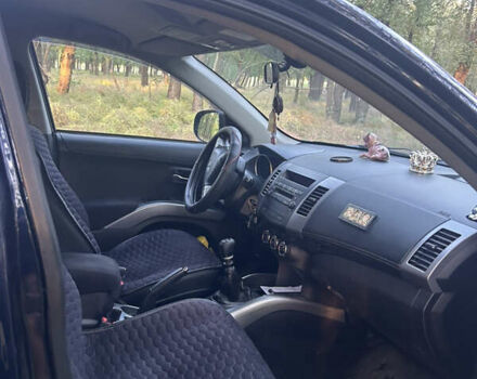 Синий Мицубиси Аутлендер, объемом двигателя 2.2 л и пробегом 250 тыс. км за 11500 $, фото 5 на Automoto.ua