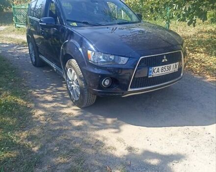 Синий Мицубиси Аутлендер, объемом двигателя 2.18 л и пробегом 223 тыс. км за 11200 $, фото 23 на Automoto.ua